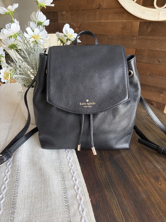 kate spade Handbags - kate spade Black Pebbled Leather Drawstring Flap Backpack